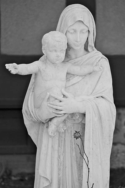 istock Virgin Mary with Baby Jesus Statue 477038991