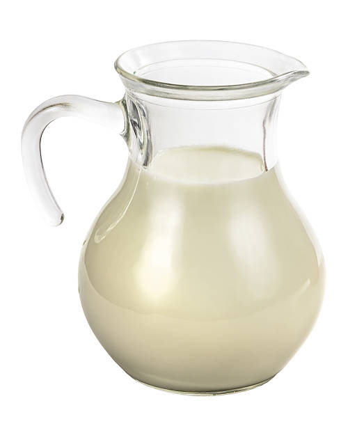 istock Clear glass jug with milk 477042153