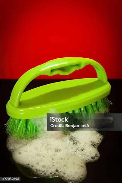 Green Brush With Soap Suds Stock Photo - Download Image Now - 2015, Bubble, Cleaning