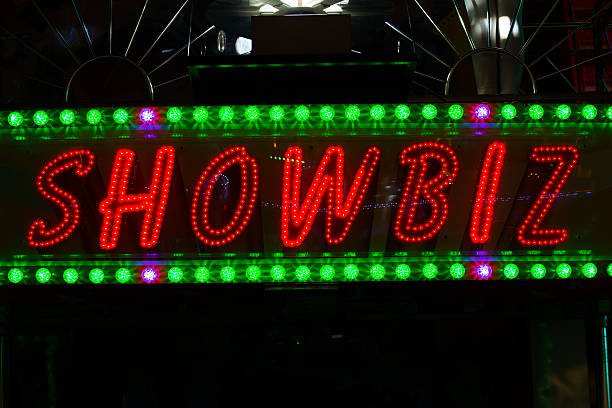 istock neon light detail at fairground during summer holiday 477046880