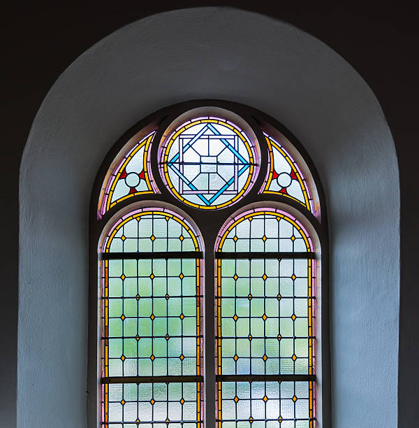 istock Stained glass window in a church 477046952