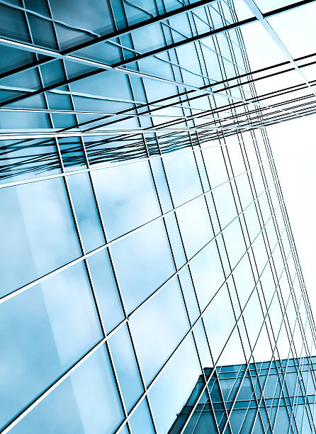 istock glass surface of contemporary angle business building 477050559