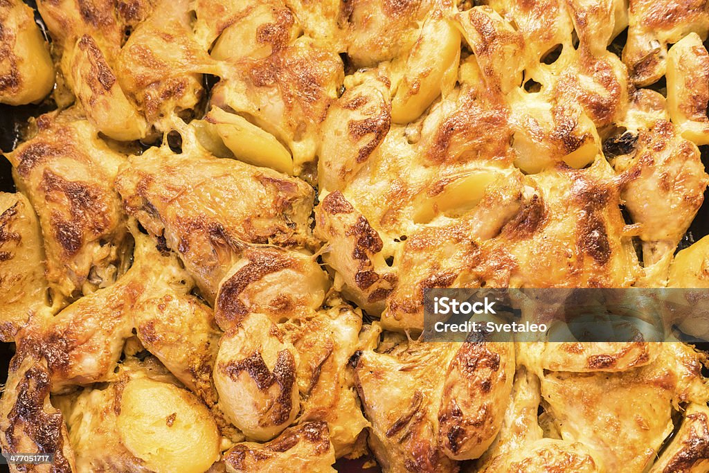 Pedaços de frango Assado e Batata - Royalty-free Alho Foto de stock