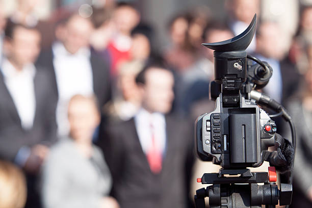istock Covering an event with a video camera 477052313