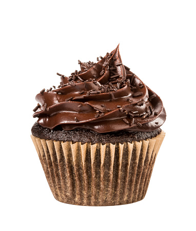 Chocolate cupcake with sprinkles  isolated on white.