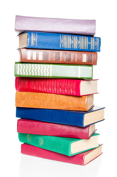 istock Old colorful books on white background 477053590