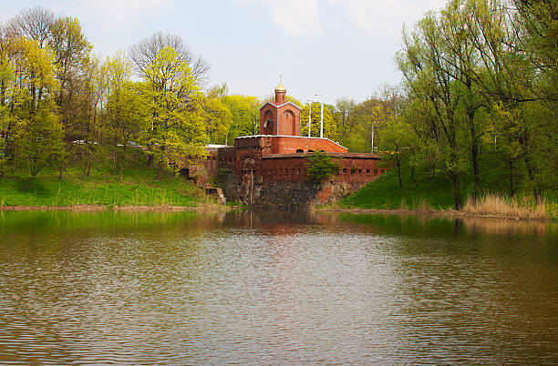 istock small chapel near the lake 477055267