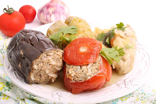 istock Stuffed eggplant pepper tomato cabbage leaves ground meat with rice 477057718