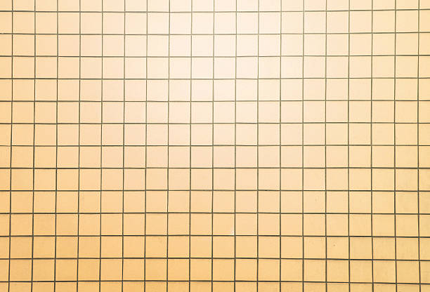 istock orange tiles wall texture with black filling 477058060