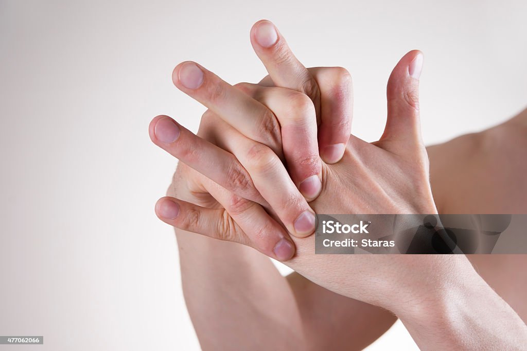 Hand Massage Hand Massage. Pain in the finger joints. Arthralgia Stretching Stock Photo
