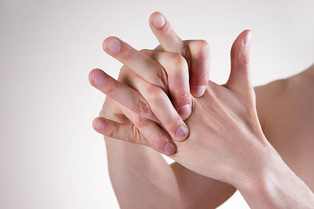 Hand Massage Hand Massage. Pain in the finger joints. Arthralgia colour enhanced stock pictures, royalty-free photos & images