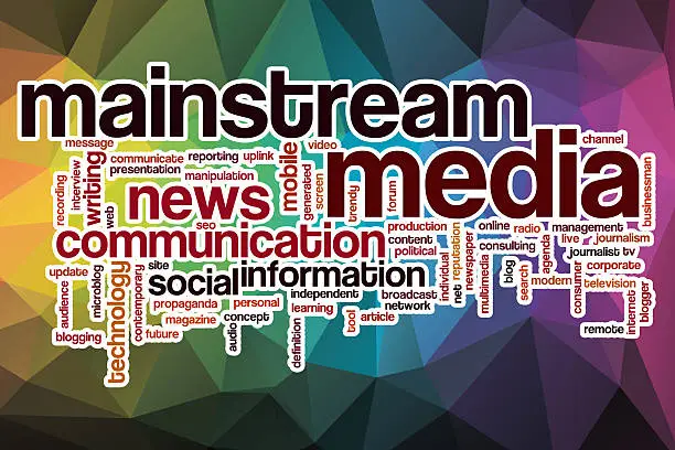 Photo of Mainstream media word cloud with abstract background