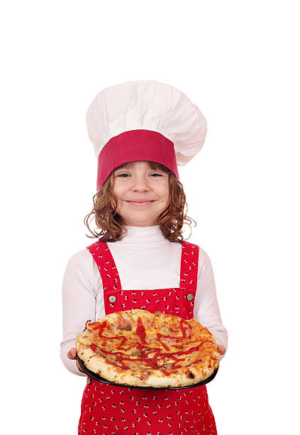 istock happy little girl cook with pizza 477065265