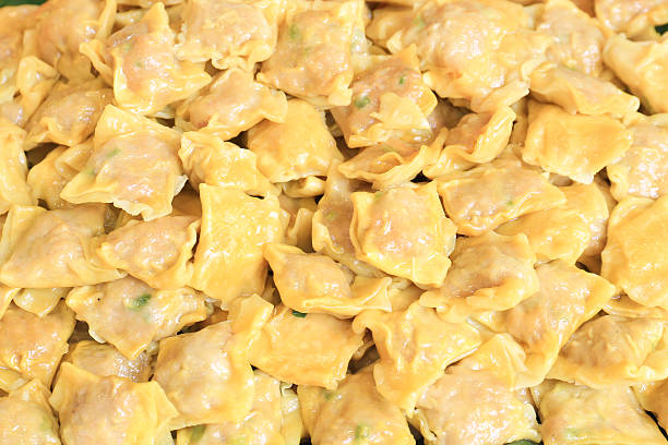 istock Yellow chinese dumpling in market 477067415