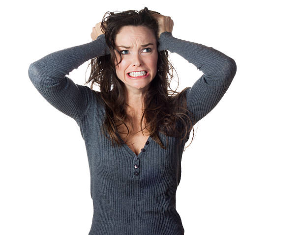 istock Frustrated woman pulling her hair 477068225