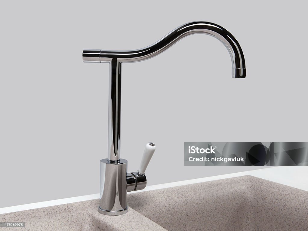 Water tap and sink in a modern kitchen Chrome Stock Photo