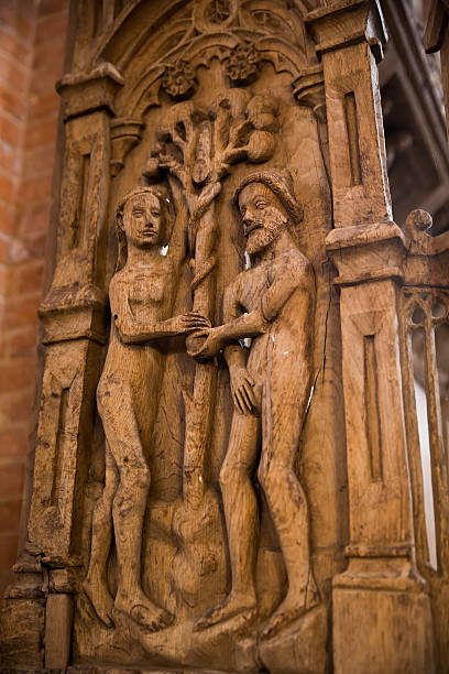 istock Adam and Eve in Sanct Bendts Church, Ringsted, Denmark 477070125