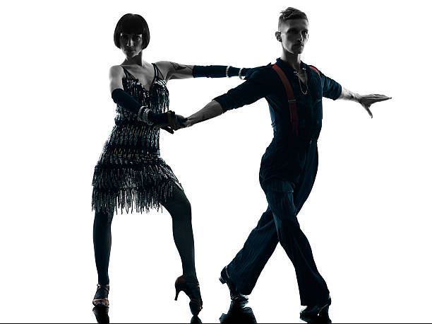istock elegant couple dancers dancing silhouette 477073342