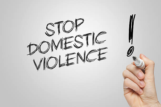 istock Hand writing stop domestic violence 477074158