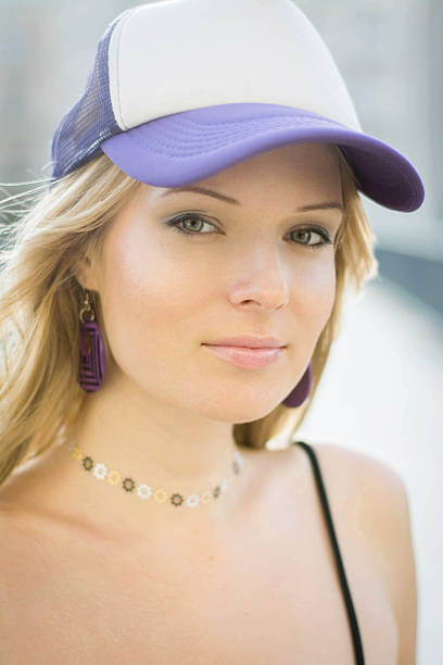 Woman with trucker hat stock photo