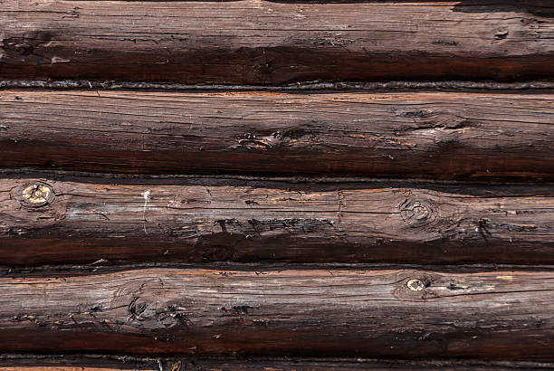 wall made of logs stock photo