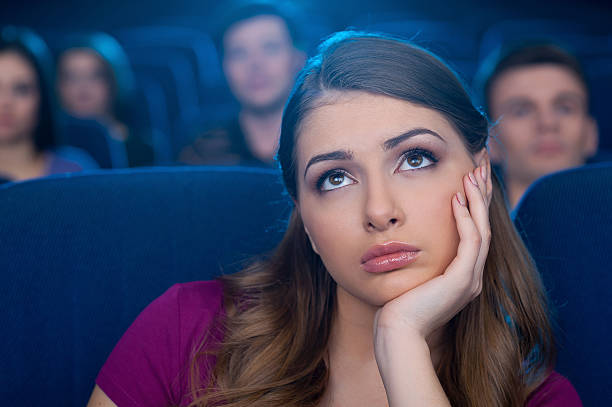 istock Watching a boring movie. 477075227