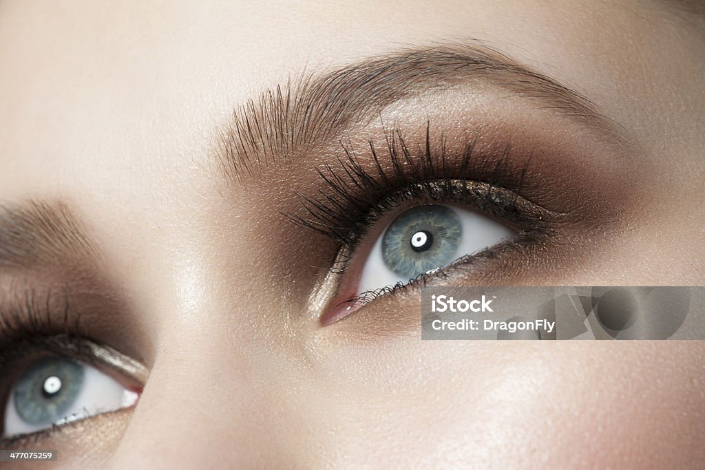 Eye makeup Closeup of beautiful woman eye with bright stylish makeup Eyelash Stock Photo