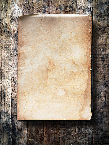 istock Old paper on grunge wood 477075265