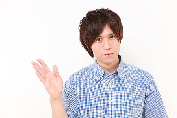 istock Japanese man presenting and showing something 477076531