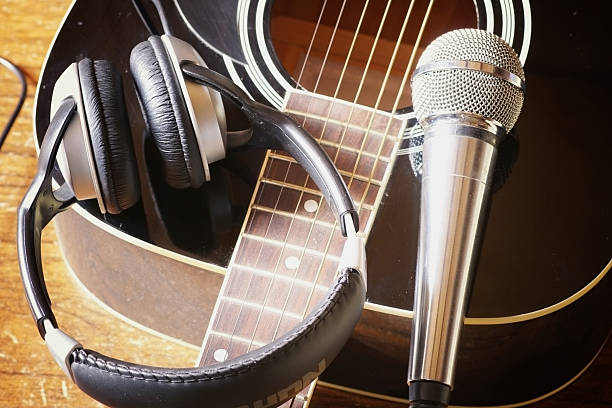 istock instrument guitar headphones and microphone 477078332