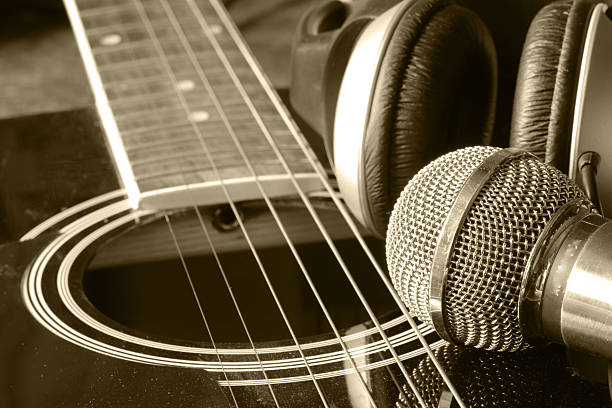 istock instrument guitar headphones and microphone 477078338