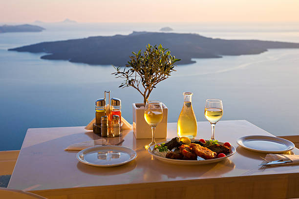 istock Romantic dinner for two at sunset.Greece, Santorini 477078438