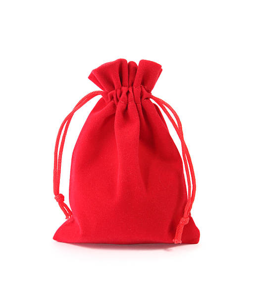 istock Red velvet bag isolated on white background 477079825