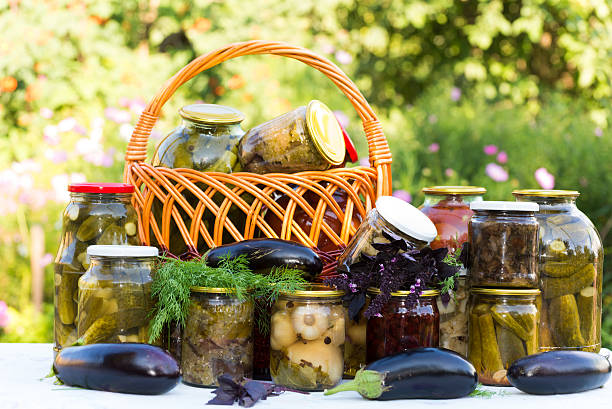 istock Home canning, canned vegetables outdoors 477085047