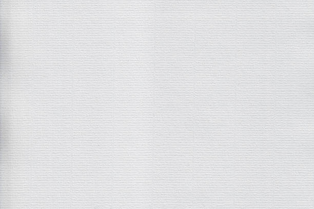 Close up of white art paper ideal for graphics backgrounds Close up photograph of art paper, ideal for scrap book, recycling or waste paper concepts.  Create mock up documents, or use the texture to add dirt or age old photographs. natural pattern photos stock illustrations
