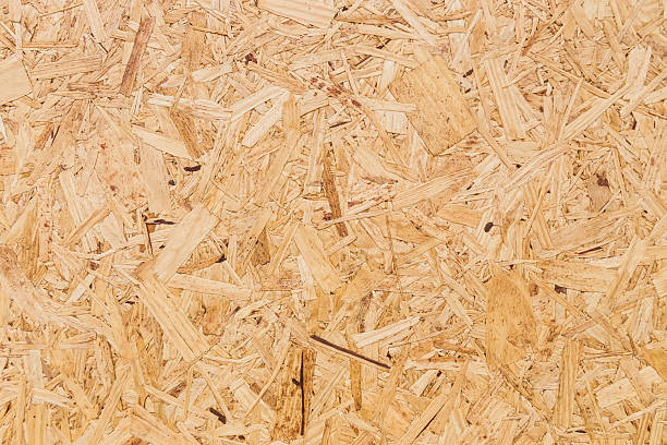 OSB panel texture close-up oriented strand board particle stock pictures, royalty-free photos & images