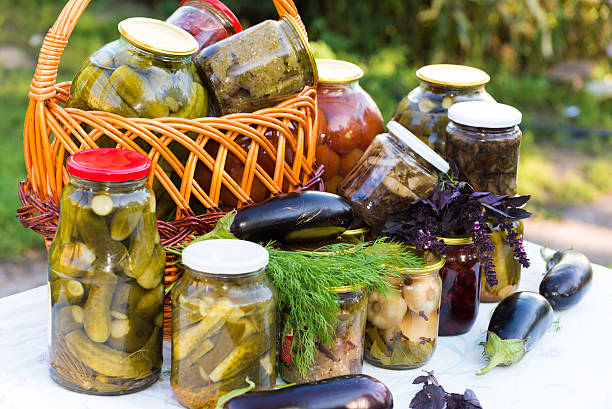 istock Home canning, canned vegetables outdoors 477089861