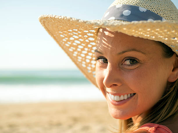 istock Smile girl at beach 477091520