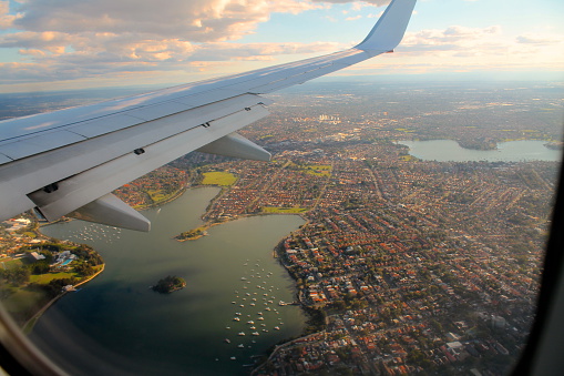 The view from the plane, overlooking the city below. This photo was taken while flying over Sydney, Australia.