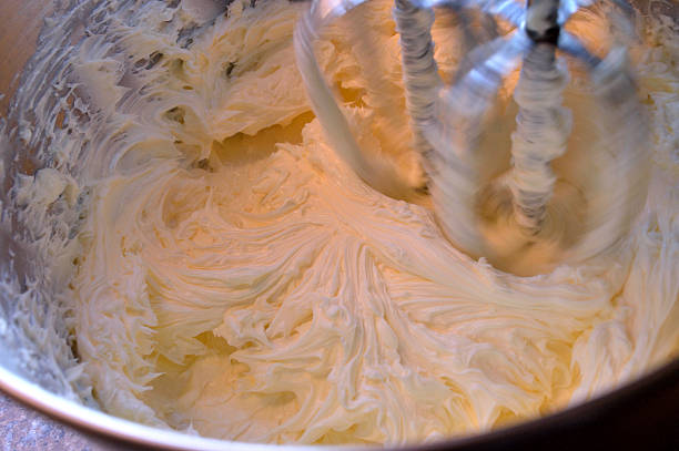 istock Whipping homemade vanilla icing in stand mixer 477093404
