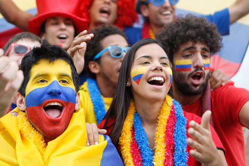Fans of Colombia cheer for their team