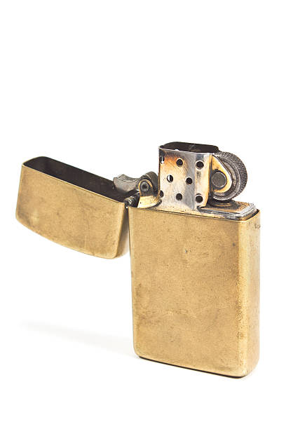 istock Golden vintage lighter isolated on white 477096693