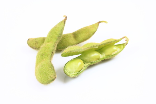 Green soybeans on white background