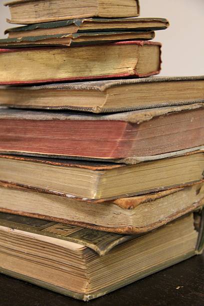 istock Nine Old Books Stacked in a Pile 477100771
