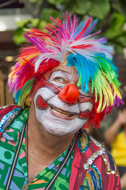 Street Carnival in Rio Rio de Janeiro, Brazil - March 1, 2014: Clown is photographed few minutes before Ipanema Band 50th Parade nudie suit stock pictures, royalty-free photos & images