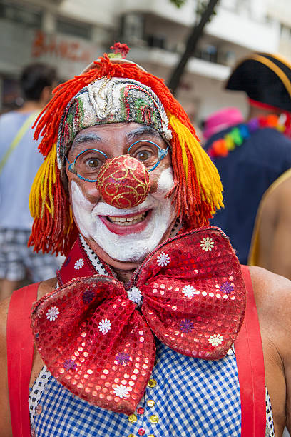 Street Carnival in Rio Rio de Janeiro, Brazil - March 2, 2014: Clowns photographed few minutes before Simpatia e Quase Amor group parades in Ipanema district streets nudie suit stock pictures, royalty-free photos & images