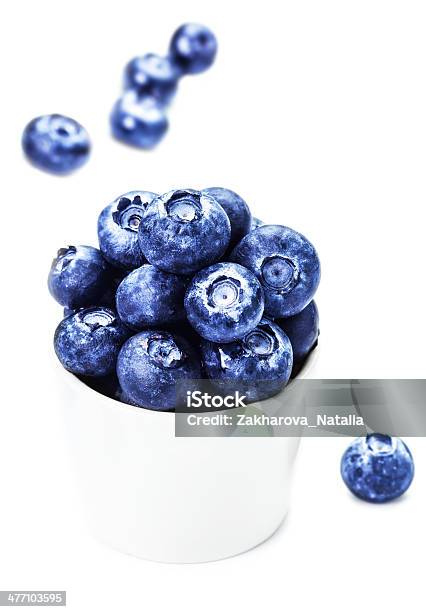 Fresh Bilberries In A Bowl Isolated On White Background Stock Photo - Download Image Now