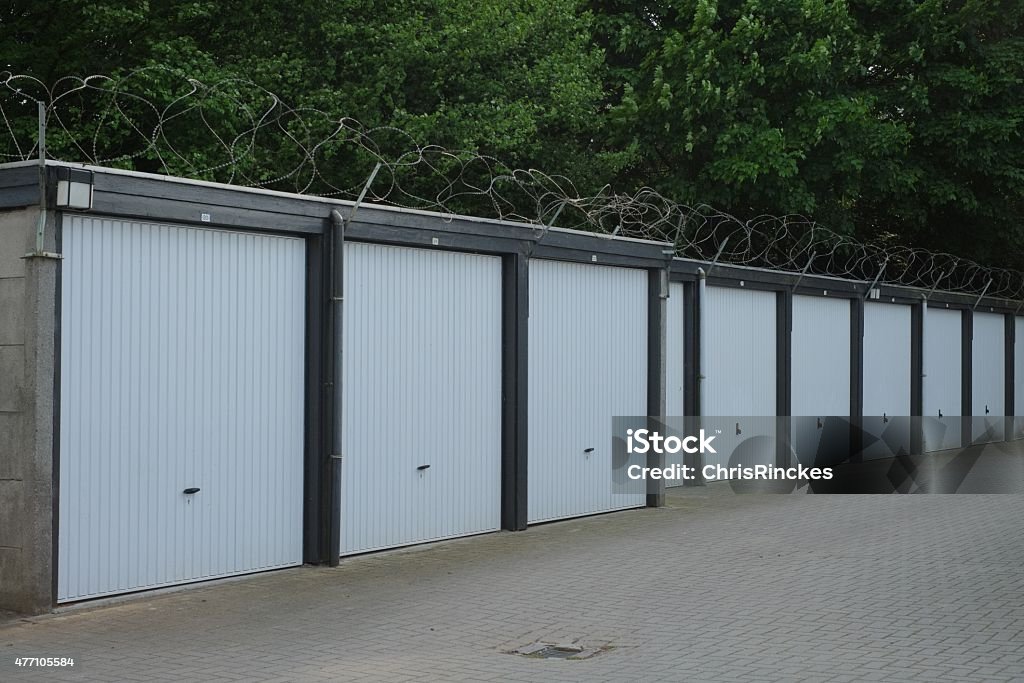 Garage boxes for rent Some white garage boxes for rent in the Dutch city of Almelo 2015 Stock Photo