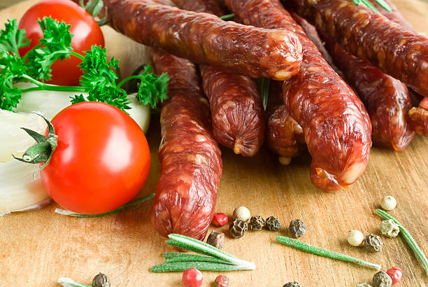 istock Smoked sausage with rosemary and peppercorns 477108255