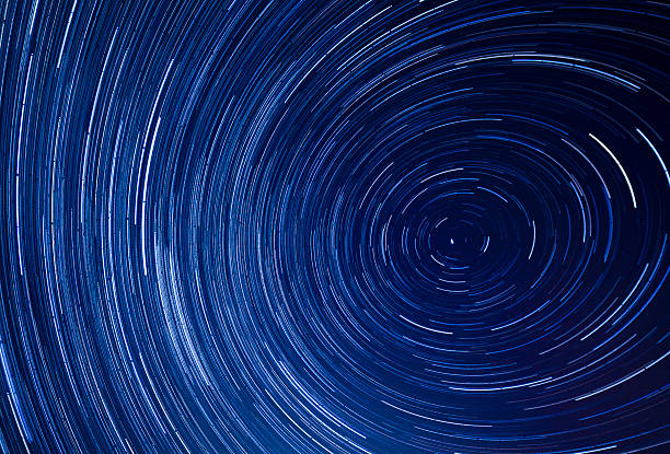 istock background of star trails in sky 477109602
